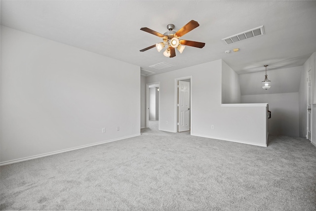 unfurnished living room featuring carpet, ceiling fan, and baseboards