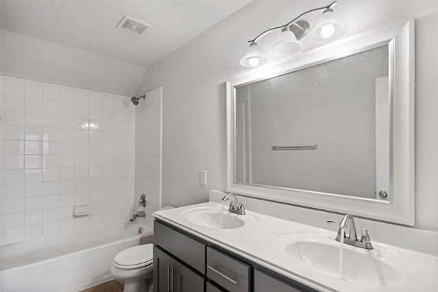 full bathroom with toilet, shower / bath combination, double vanity, and vaulted ceiling