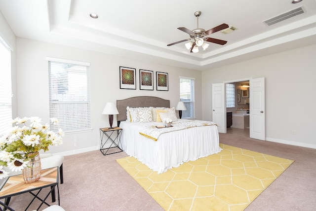 5530 Riverstone Crossing Dr, Sugar Land, TX 77479 - bedroom with a raised ceiling, light colored carpet, baseboards, and recessed lighting