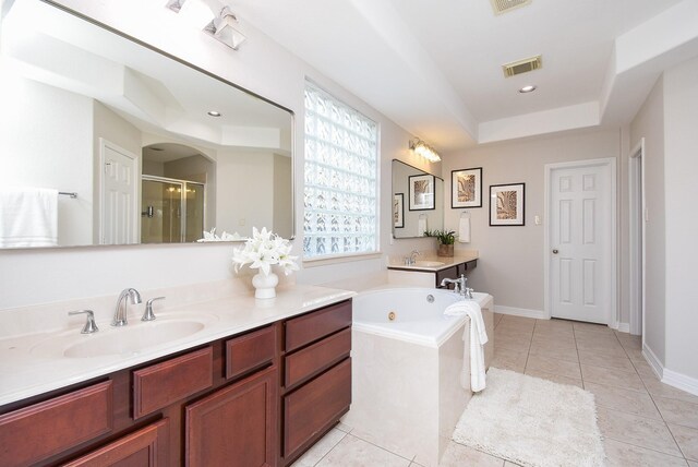 5530 Riverstone Crossing Dr, Sugar Land, TX 77479 - bathroom featuring a shower stall, tile patterned flooring, a jetted tub, and vanity