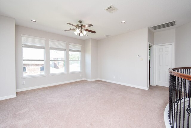 5530 Riverstone Crossing Dr, Sugar Land, TX 77479 - unfurnished room featuring light colored carpet, ceiling fan, recessed lighting, and baseboards