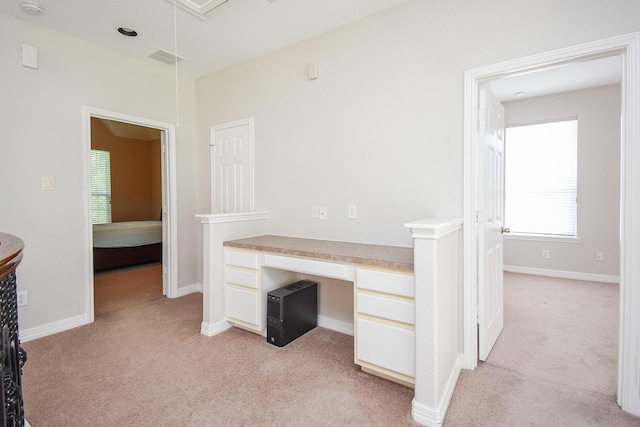 5530 Riverstone Crossing Dr, Sugar Land, TX 77479 - unfurnished office featuring light colored carpet, built in study area, attic access, and baseboards