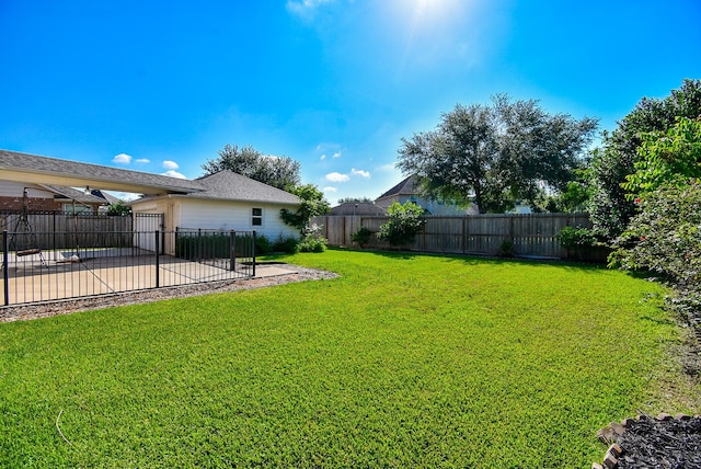 5530 Riverstone Crossing Dr, Sugar Land, TX 77479 - view of yard with a patio and a garage