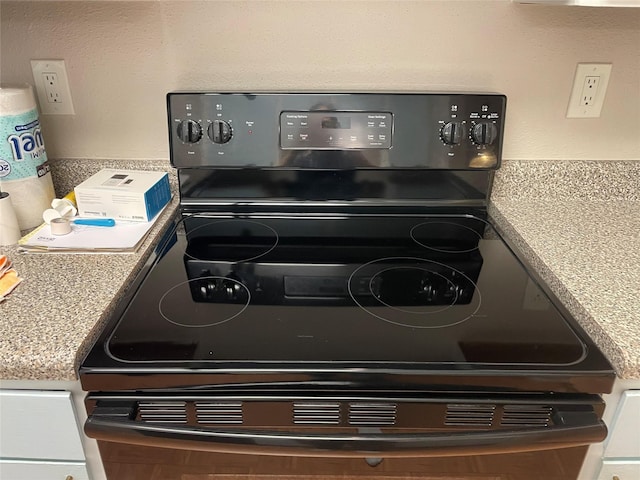 7950 N Stadium Dr Unit 210, Houston, TX 77030 - kitchen view of black range with electric stovetop