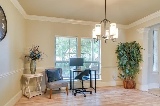 sitting room featuring light wood-style floors, crown molding, a chandelier, and baseboards