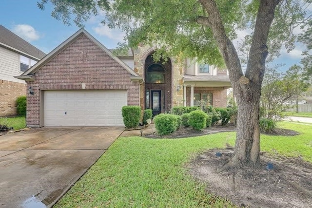 view of front of house featuring driveway, brick siding, a garage, and a front lawn