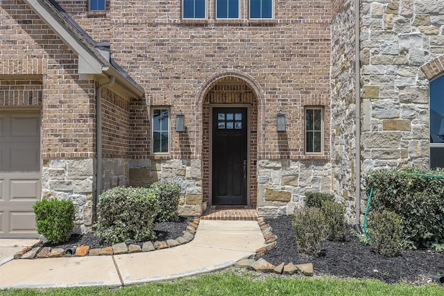 12510 Grayton Dr, Texas City, TX 77568 - view of exterior entry featuring stone siding and brick siding