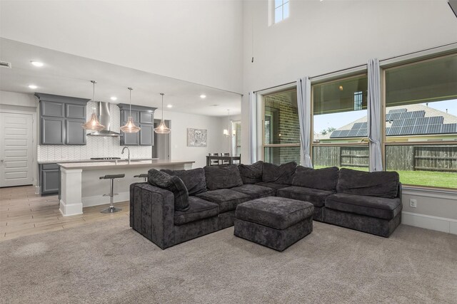 12510 Grayton Dr, Texas City, TX 77568 - living area featuring plenty of natural light, light colored carpet, and recessed lighting