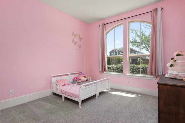 12510 Grayton Dr, Texas City, TX 77568 - bedroom with carpet floors and baseboards