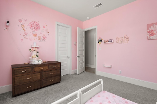 12510 Grayton Dr, Texas City, TX 77568 - bedroom featuring light colored carpet and baseboards
