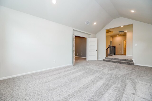 12510 Grayton Dr, Texas City, TX 77568 - unfurnished living room with lofted ceiling, carpet floors, recessed lighting, and baseboards
