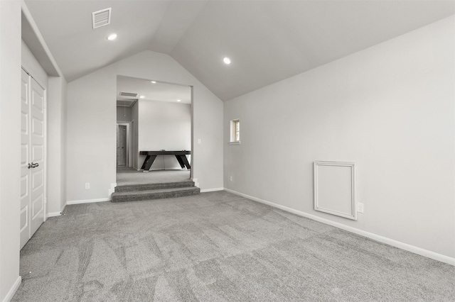 12510 Grayton Dr, Texas City, TX 77568 - empty room with lofted ceiling, carpet floors, recessed lighting, and baseboards