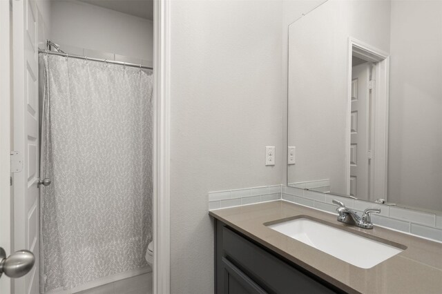 12510 Grayton Dr, Texas City, TX 77568 - bathroom with vanity, toilet, and a shower with shower curtain