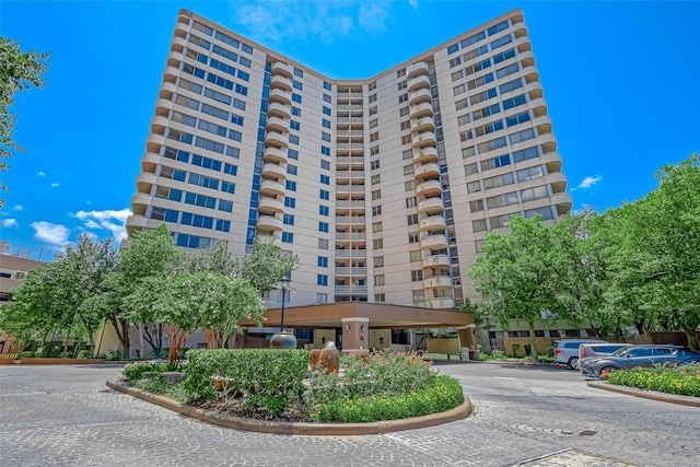 view of property with parking