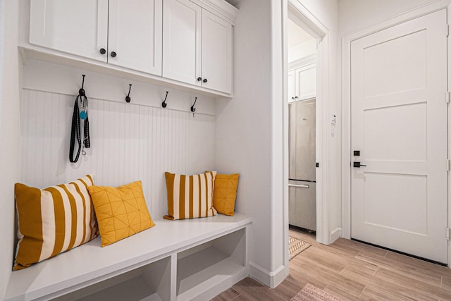 1703 Madera Oaks Ct, Conroe, TX 77304 - mudroom with light wood-style flooring and baseboards