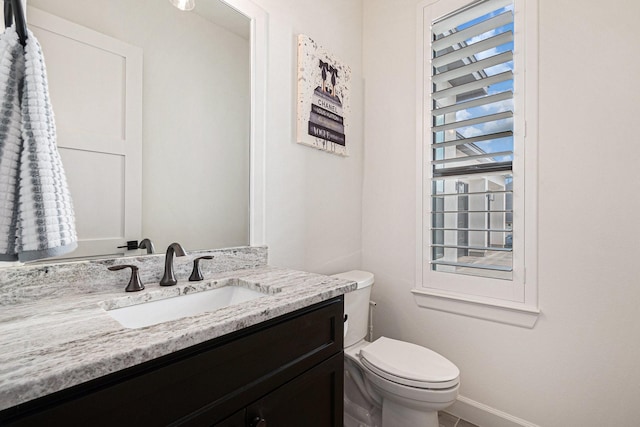1703 Madera Oaks Ct, Conroe, TX 77304 - bathroom featuring baseboards and vanity