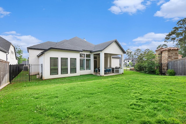 1703 Madera Oaks Ct, Conroe, TX 77304 - rear view of house featuring a patio, stucco siding, a fenced backyard, and a shingled roof