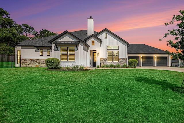 1703 Madera Oaks Ct, Conroe, TX 77304 - modern inspired farmhouse with stone siding, a chimney, board and batten siding, and driveway