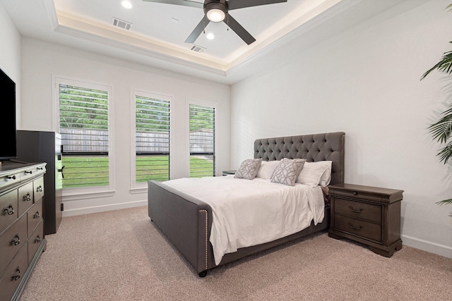 1703 Madera Oaks Ct, Conroe, TX 77304 - bedroom with light colored carpet, a raised ceiling, ceiling fan, crown molding, and recessed lighting