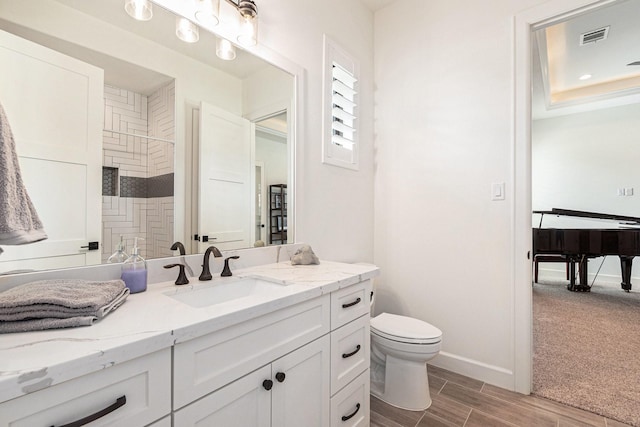1703 Madera Oaks Ct, Conroe, TX 77304 - bathroom with vanity and wood finished floors
