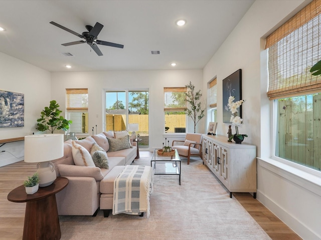 930 Mansfield St, Houston, TX 77091 - living area with light wood-type flooring, recessed lighting, ceiling fan, and baseboards