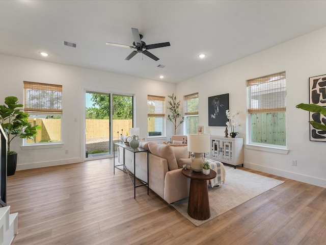 930 Mansfield St, Houston, TX 77091 - living area featuring ceiling fan, light wood-style floors, baseboards, and recessed lighting