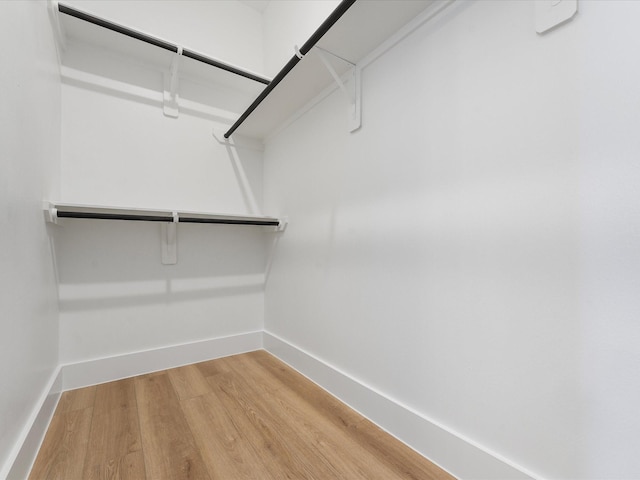930 Mansfield St, Houston, TX 77091 - walk in closet featuring wood finished floors
