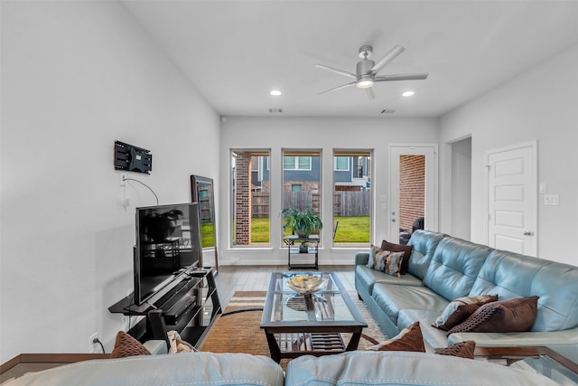 11822 Radura Rd, Humble, TX 77346 - living room with a ceiling fan, wood finished floors, recessed lighting, and baseboards