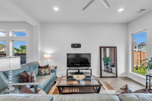 11822 Radura Rd, Humble, TX 77346 - living room featuring recessed lighting, wood finished floors, ceiling fan, and baseboards