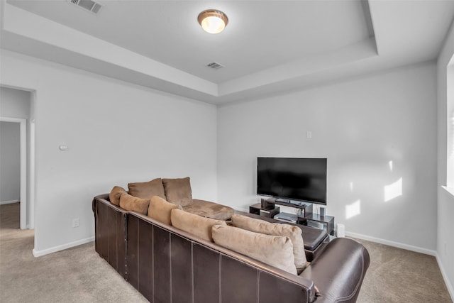 11822 Radura Rd, Humble, TX 77346 - living room with light carpet, baseboards, and a tray ceiling