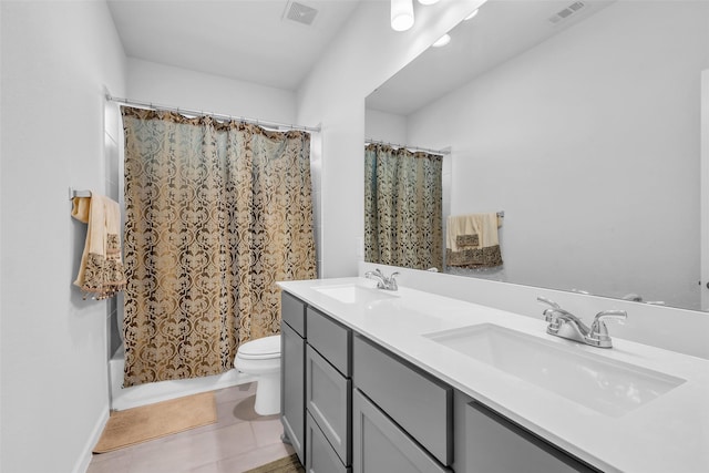 11822 Radura Rd, Humble, TX 77346 - bathroom with toilet, double vanity, shower / tub combo with curtain, and tile patterned flooring