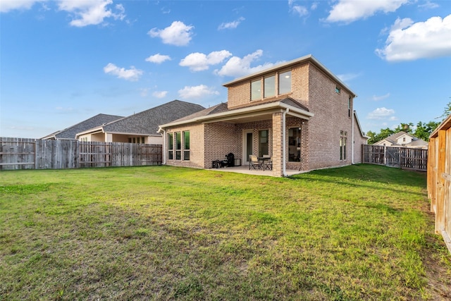 11822 Radura Rd, Humble, TX 77346 - back of property with brick siding and a patio
