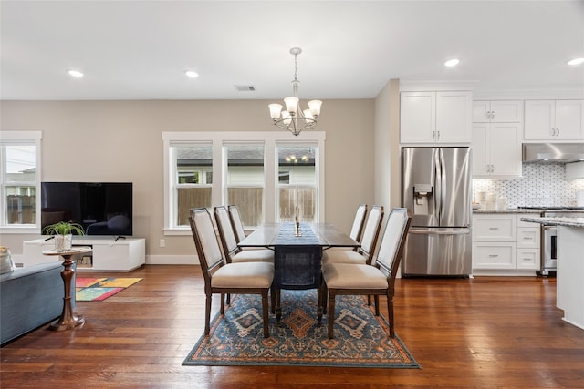 2714 Gano St, Houston, TX 77009 - dining space featuring a chandelier, dark wood-style floors, and recessed lighting