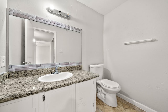 4166 Belle Park Dr Unit 4166, Houston, TX 77072 - bathroom featuring toilet, vanity, baseboards, and tile patterned flooring