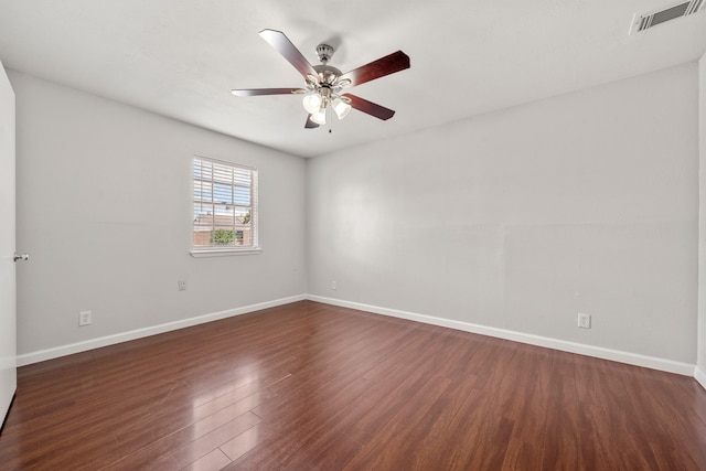 4166 Belle Park Dr Unit 4166, Houston, TX 77072 - spare room with ceiling fan, baseboards, and dark wood finished floors