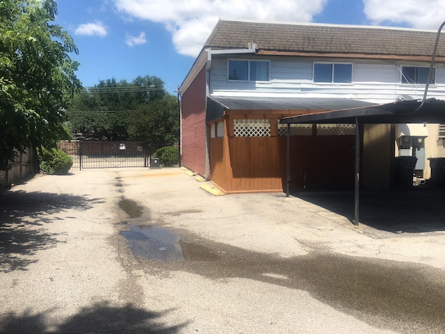 6211 Fondren Rd Unit 25, Houston, TX 77036 - view of side of property with a gate and fence