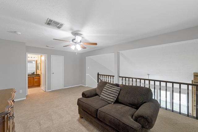 2526 Windswept Dr, Richmond, TX 77406 - living area with light carpet, a ceiling fan, and baseboards