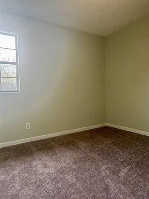 612 S 15th St, Nederland, TX 77627 - carpeted empty room featuring baseboards