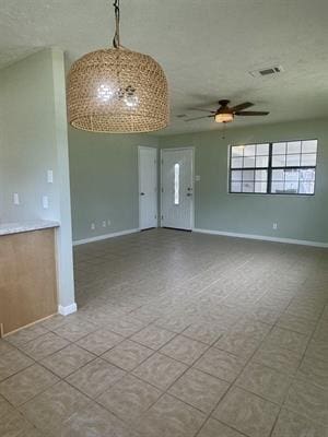 612 S 15th St, Nederland, TX 77627 - unfurnished room featuring a ceiling fan and baseboards