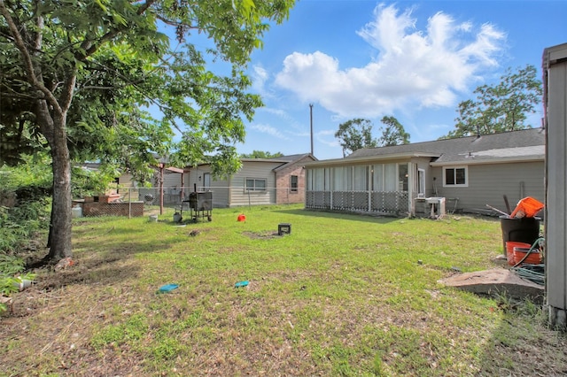 1911 Thonig Rd, Houston, TX 77055 - view of yard with a sunroom