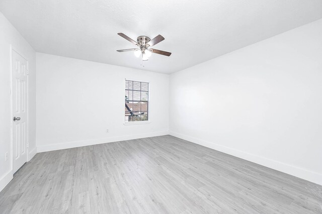 7109 Chasewood Dr, Houston, TX 77489 - unfurnished room featuring wood finished floors, a ceiling fan, and baseboards
