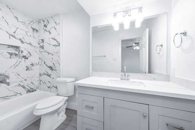 7109 Chasewood Dr, Houston, TX 77489 - full bathroom featuring toilet, vanity, wood finished floors, shower / bath combination, and ceiling fan