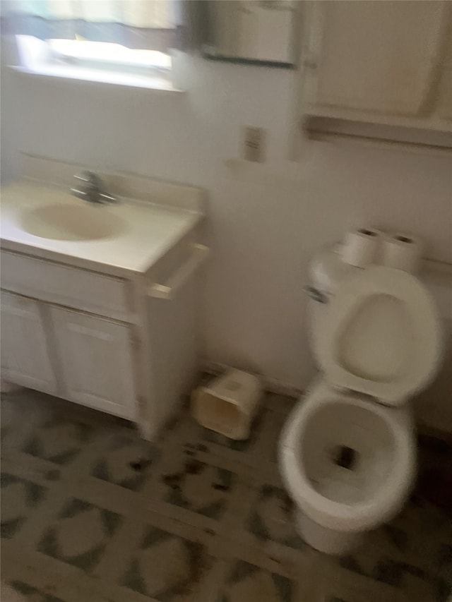 1401 8th St, Bay City, TX 77414 - bathroom featuring toilet and vanity