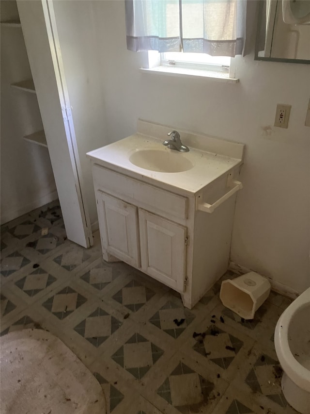 1401 8th St, Bay City, TX 77414 - bathroom with tile patterned floors and vanity