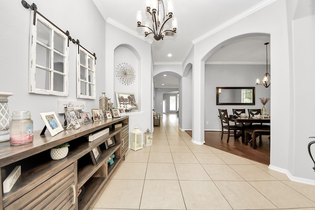419 Sunny River Ln, Richmond, TX 77406 - corridor featuring a chandelier, arched walkways, crown molding, light tile patterned flooring, and baseboards