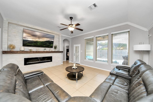 419 Sunny River Ln, Richmond, TX 77406 - living room with tile patterned floors, a fireplace, ceiling fan, baseboards, and crown molding