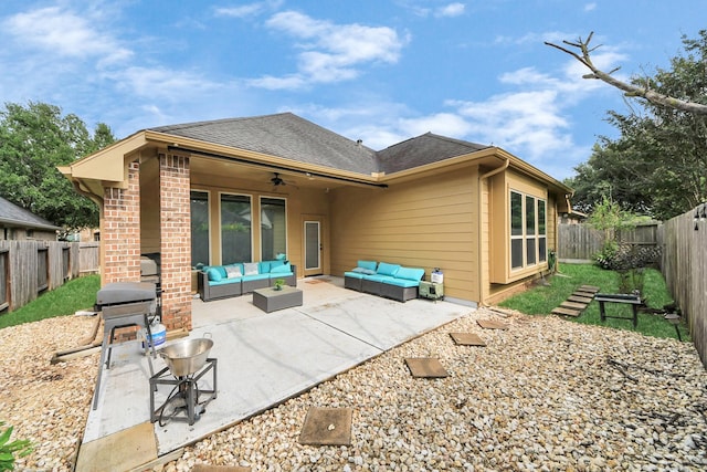 419 Sunny River Ln, Richmond, TX 77406 - rear view of property featuring outdoor lounge area, a ceiling fan, a fenced backyard, a patio area, and roof with shingles