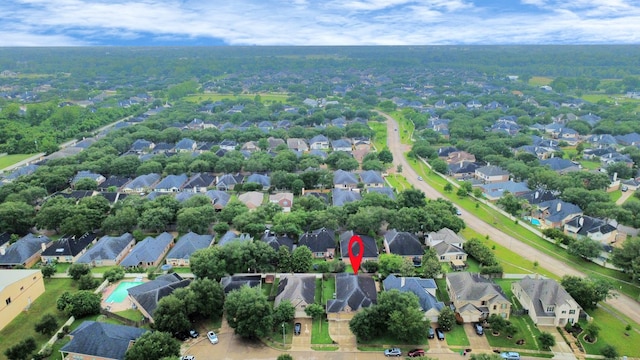 419 Sunny River Ln, Richmond, TX 77406 - aerial view of property and surrounding area featuring nearby suburban area and a pool area