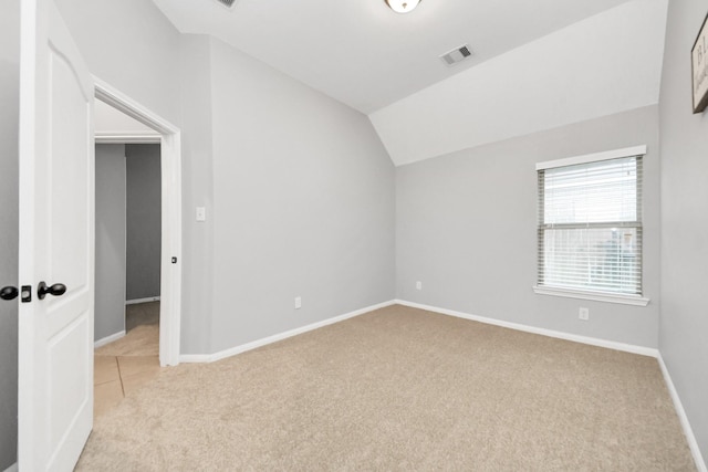 419 Sunny River Ln, Richmond, TX 77406 - empty room with light colored carpet, lofted ceiling, and baseboards