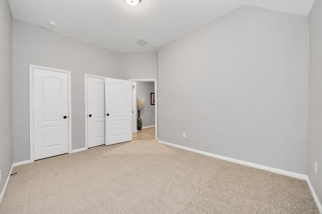 419 Sunny River Ln, Richmond, TX 77406 - unfurnished bedroom featuring carpet, baseboards, and vaulted ceiling